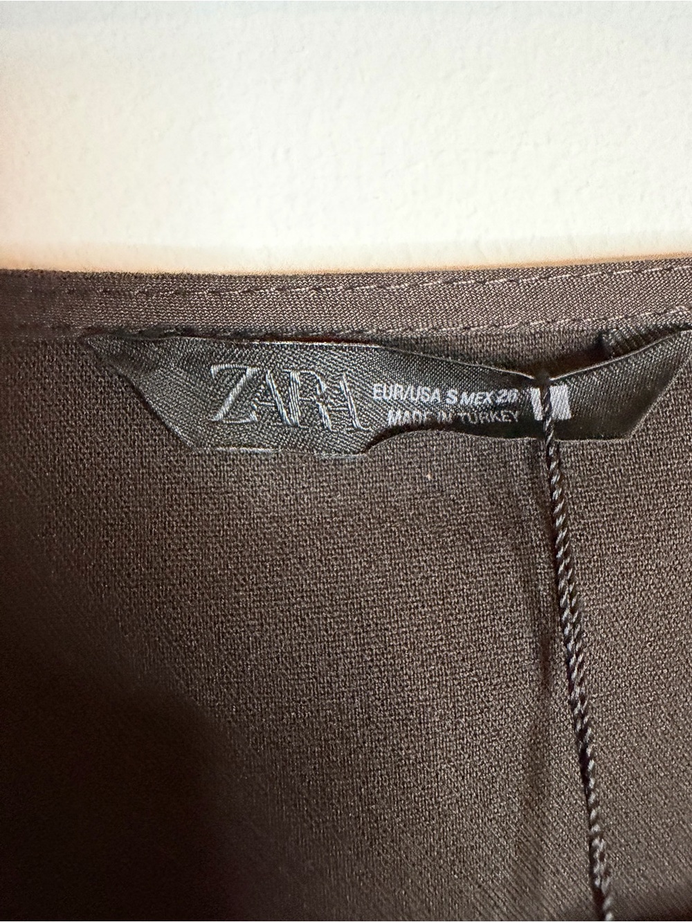 Zara Sleeveless V-Neck Vest with Buckle Accents - Picture 6 of 6